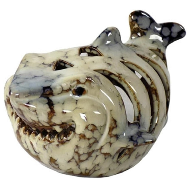 ceramic shark designed candle holder. 