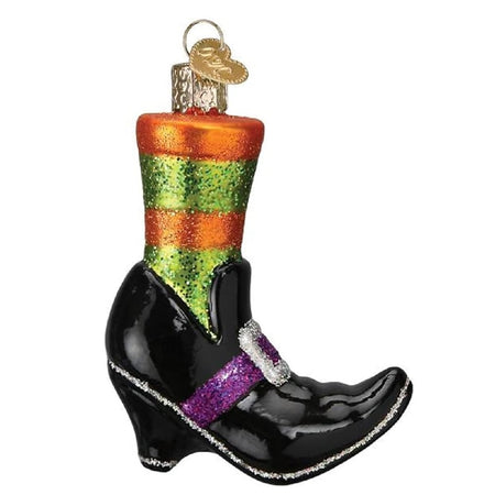 blown glass ornament depicting a black witches shoe with a green and orange striped sock 