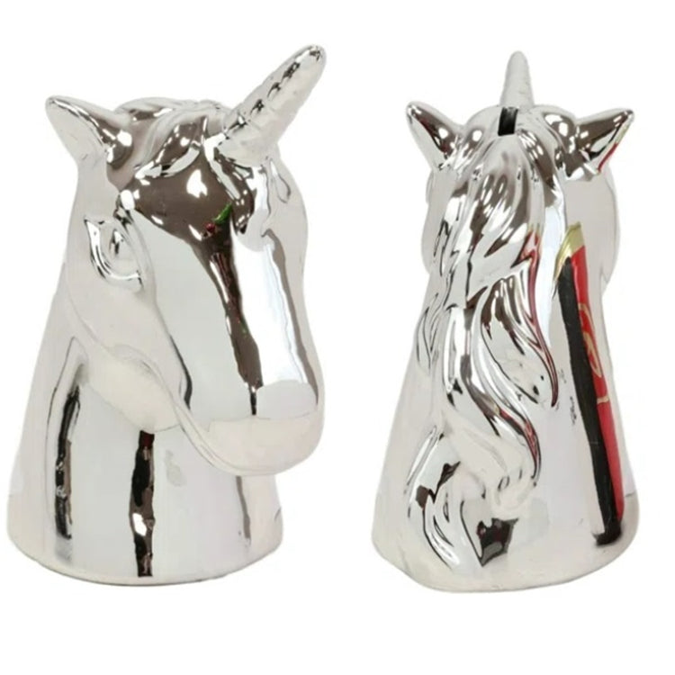 silver bank in the shape of a unicorn head.  Photo shows both front and back.