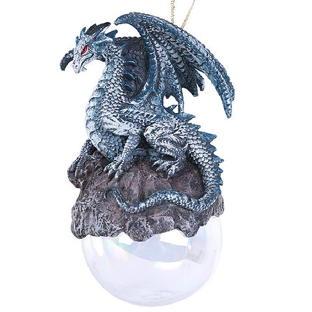 Silvery blue dragon sitting on silver sphere ornament