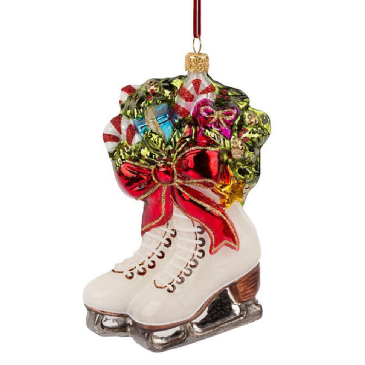 blown glass hanging ornament, white ice skates with red ribbon and candy canes