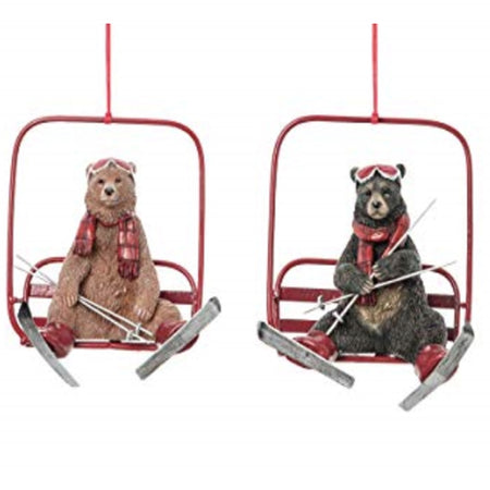 2 hanging ornament.  One brown bear and one black bear each on a red ski life wearing a red scarf, goggles and skis.
