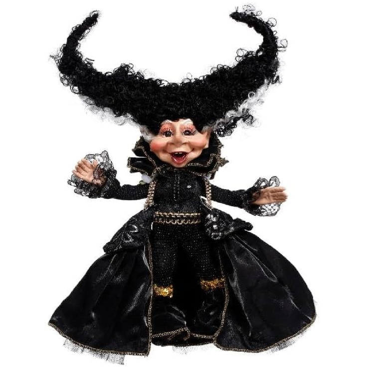 Figurine in a frankenstein's bride inspired black costume with long hair on a white background