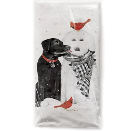 White kitchen towel with a black lab next to a snowman that is shaped like a dog. 2 red cardinals