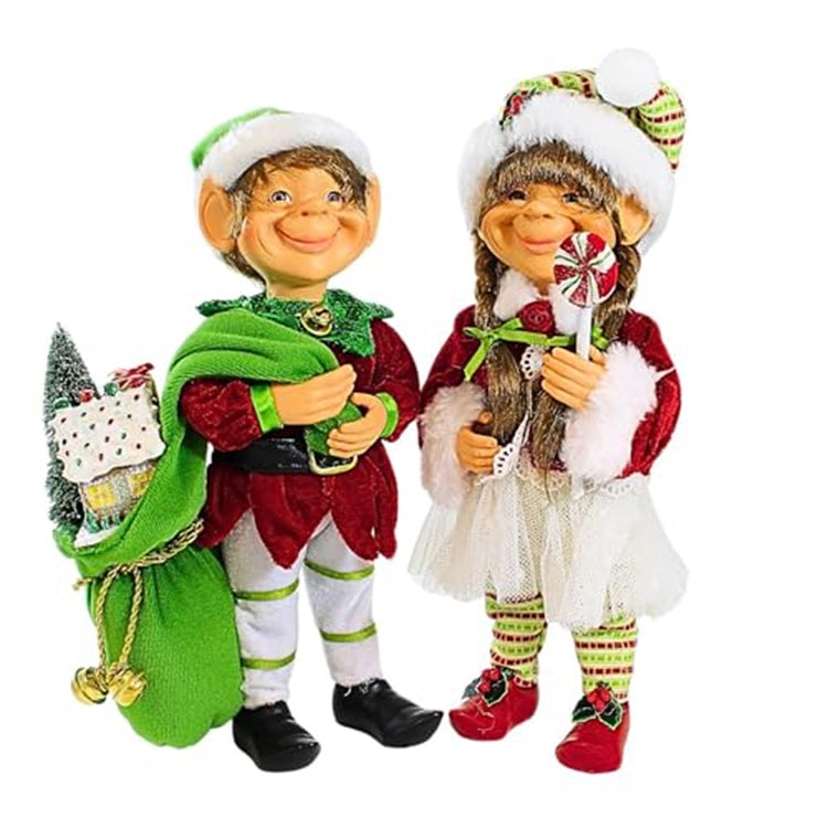 2 standing elf figures, 1 boy and one girl. The girl holds a peppermint lollipop the boy a bag of gifts 