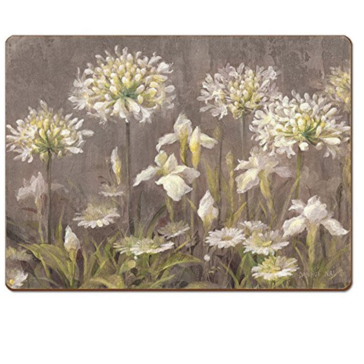 Rectangle shape hardboard placemat in shades of tan with white spring flowers growing.