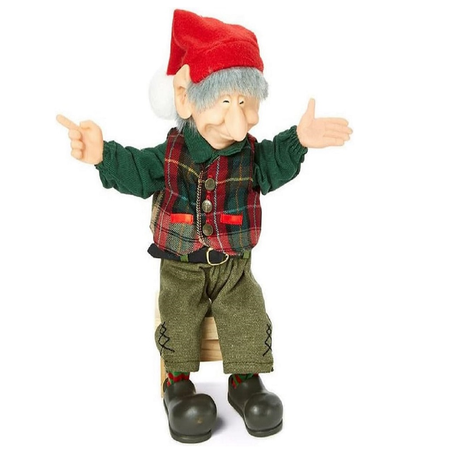 Steven the elf is wearing green pants, a dark green shirt with a green and red vest and red stocking cap.
