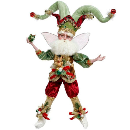 Mark Roberts Stocking Maker Christmas Fairy Figurine Small 11 Inches holding a small gift wearing festive red and green outfit with sparkling accents handcrafted holiday decor