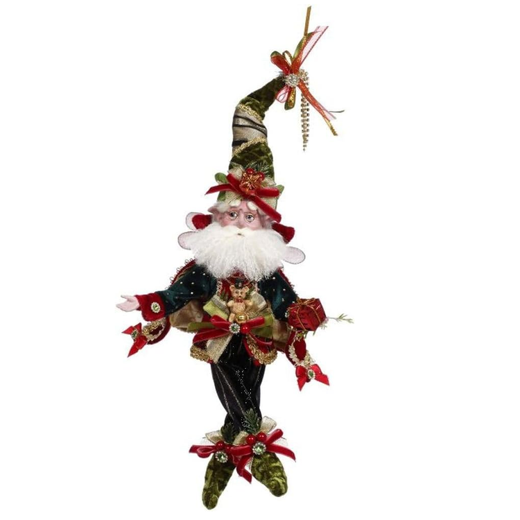 Decorative Christmas figure of a gnome with a white beard, dressed in festive attire, on a white background.