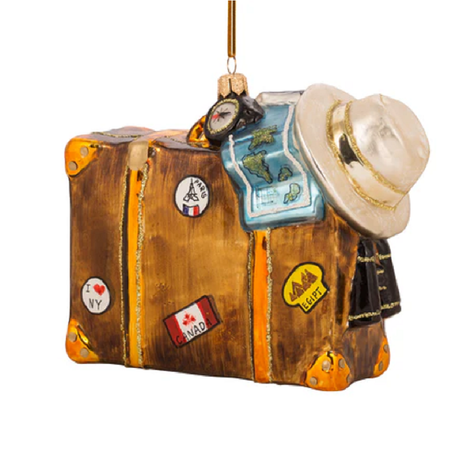 blown glass suitcase ornament with map and hat.