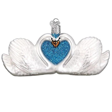 blown glass ornament of two swans making a heart shape.