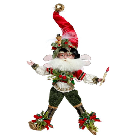 bearded fairy in red stocking cap with jingle bell, green pants, and holding a paintbrush.