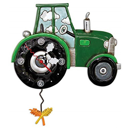 wall clock designed to look like a green tractor with wheat shaped pendulum