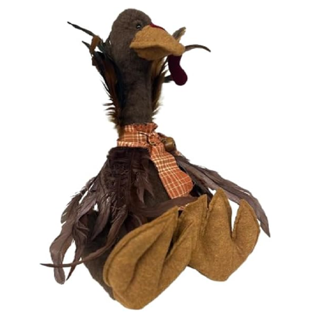 Decorative turkey figure with plaid bow tie on a white background