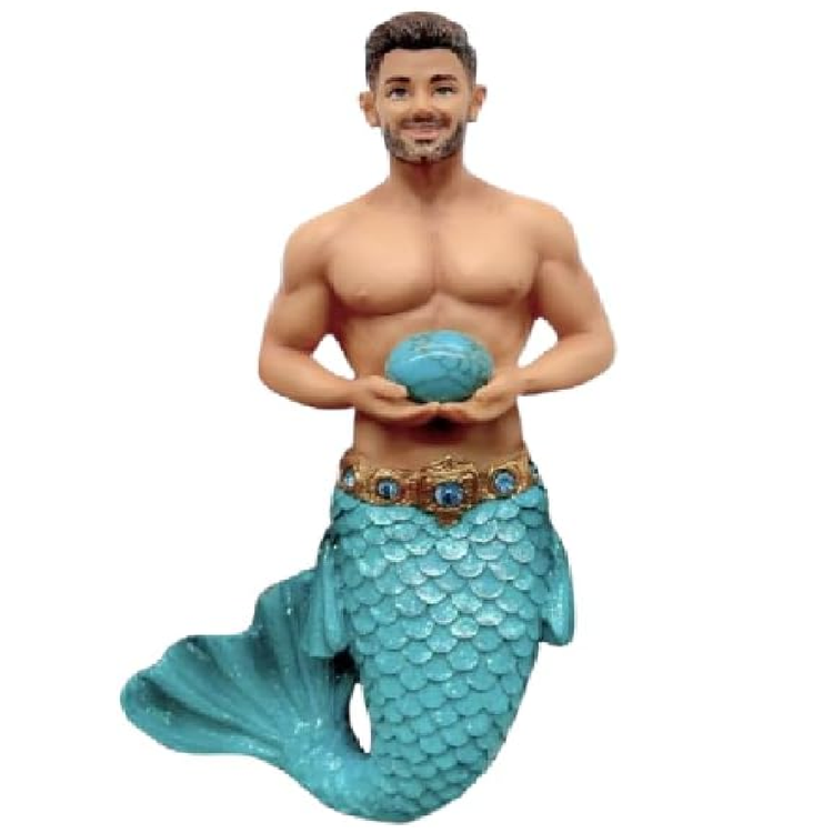 Merman figurine with turquoise tail and holding a turquoise gem stone, on a white background