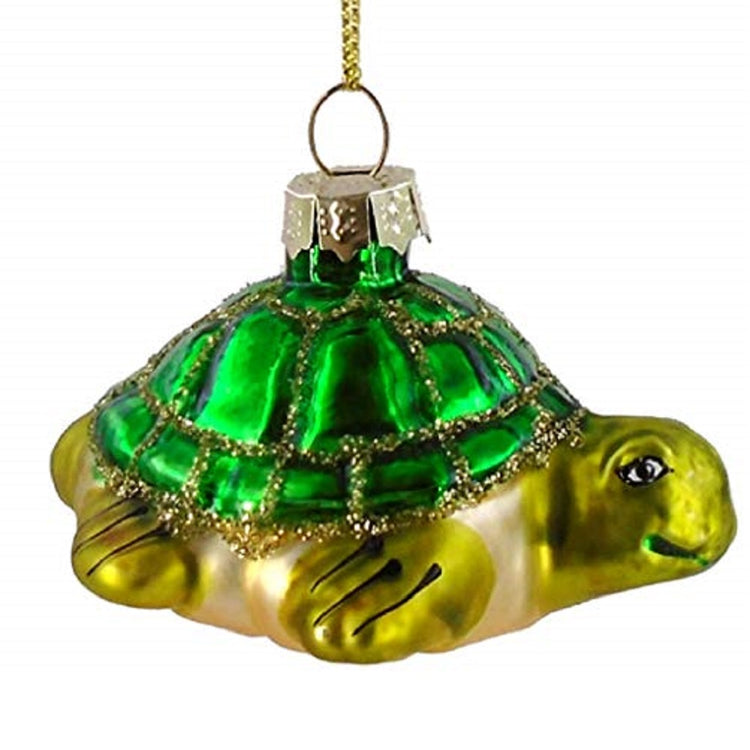 Sea turtle shaped hanging ornament in shades of green with glitter accent on the shell