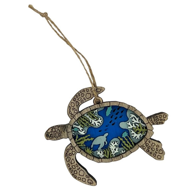 carved wood turtle ornament that is multi-demensional with turtles and coral in blue