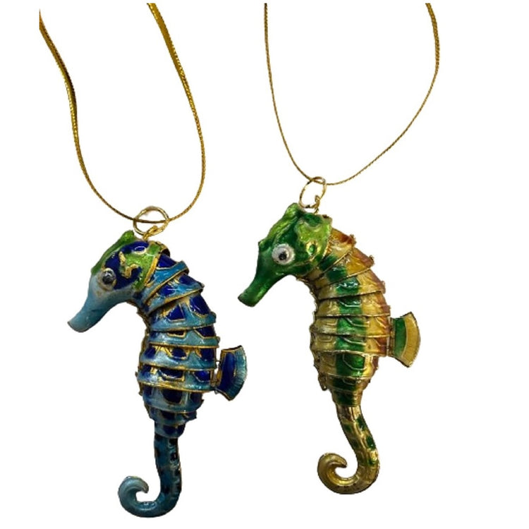 2 articulated seahorse ornaments, one blue and one green and orange