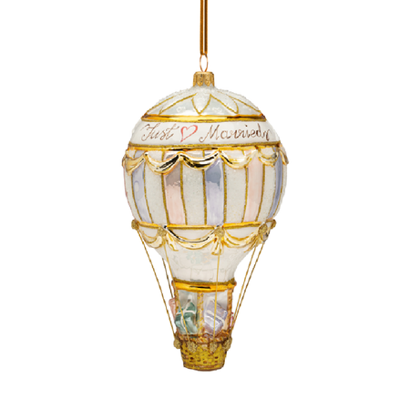 Blown glass hot air balloon ornament in light pastels, white and gold. Says "just married" on balloon.