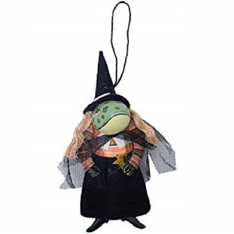 Toad hanging ornament wearing a pointy witch hat, long dress, orange plad top and netting cape. She has a toad face.