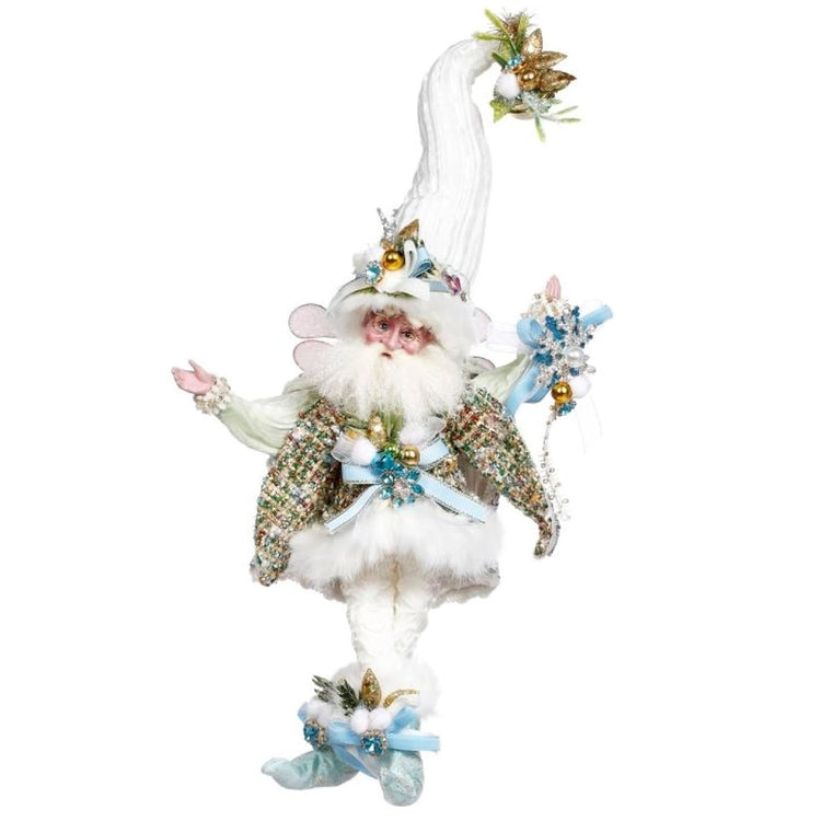 bearded fairy in white outfit with sparkly vest and snowflake accents.