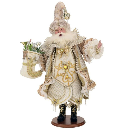 santa in a gold accented cream outfit, holding a matching stocking with mistletoe and toys.