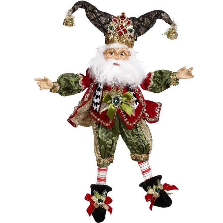 elf figure with green and red outfit, black booties, a green double pointy ht with bells.
