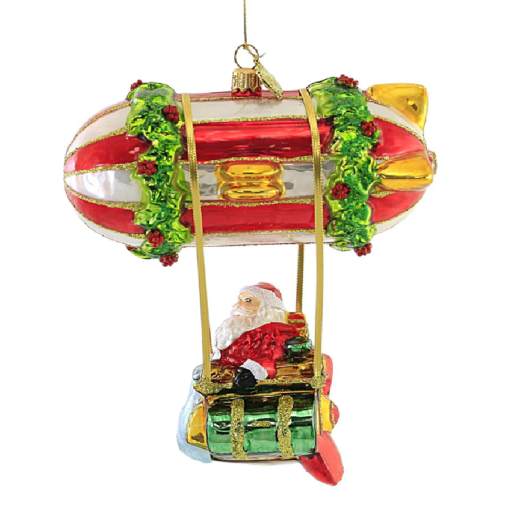 blown glass hanging ornament featuring Santa in a colorful airship