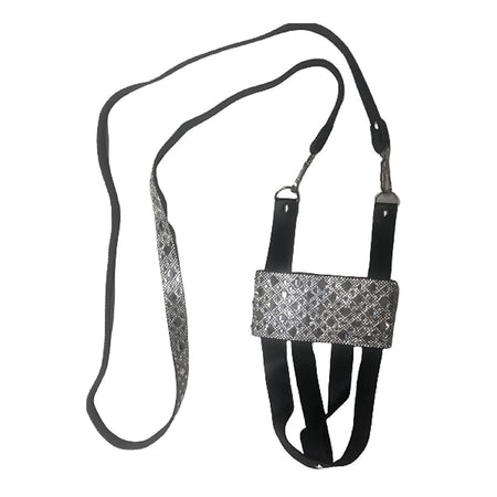 black harness with lots of silver bead like bling and a long matching strap