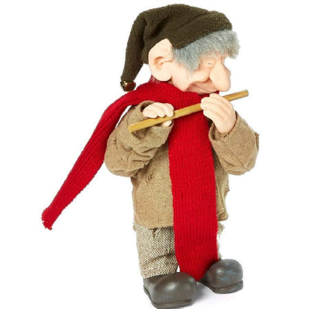Standing Elf figurine.  He wears a green brown pointing hat, brown tweed pants, tan tweed jacket with a red scarf  He is playing a flute.