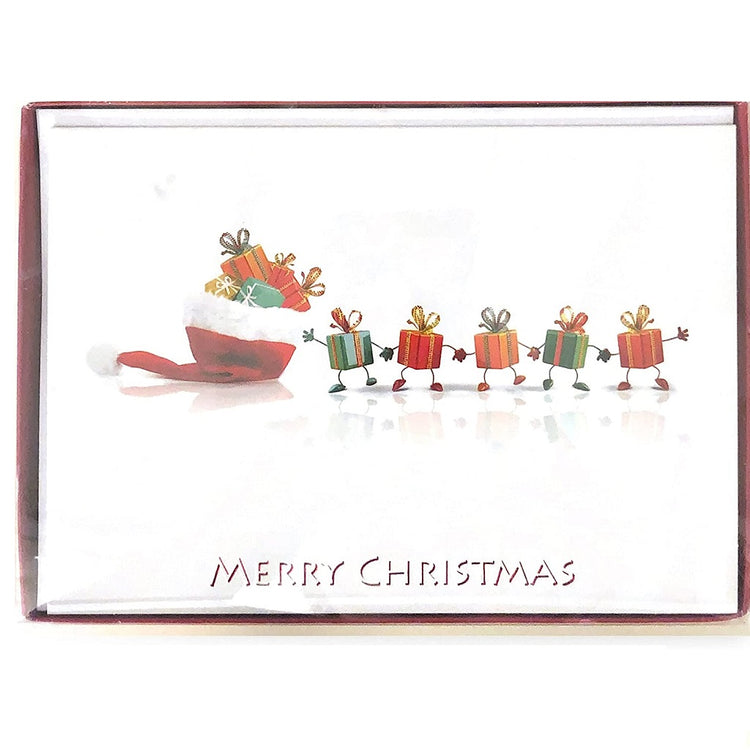 Box of Christmas cards.  White cards with a Santa hat full of gifts. There is a parade of gifts holding hands marching beside the hat. The text says Merry Christmas.