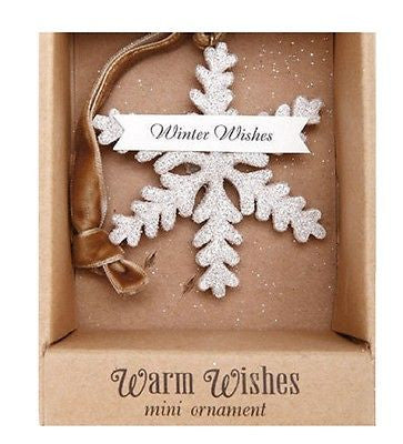 White snowflake shaped ornament with brown ribbon hanger in brown box with text "Warm Wishes Mini Ornament"