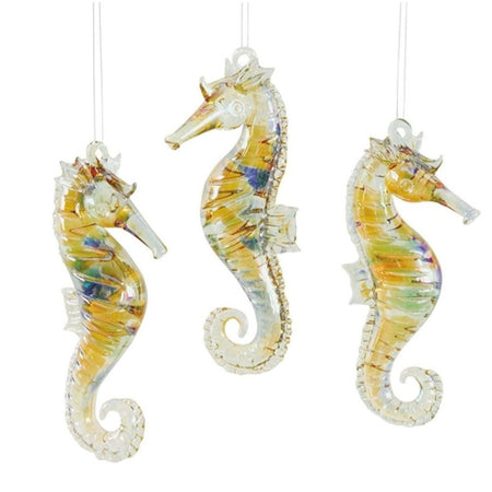 3 glass seahorse ornaments. Yellow with brown, green, blue and purple accents, muted colors.
