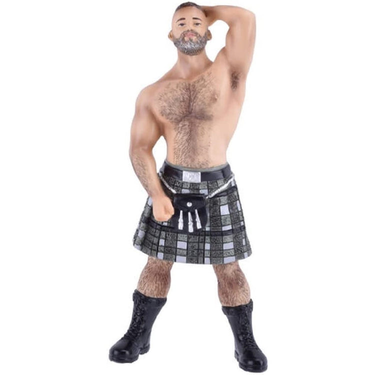 Hairy man wearing a kilt & boots.