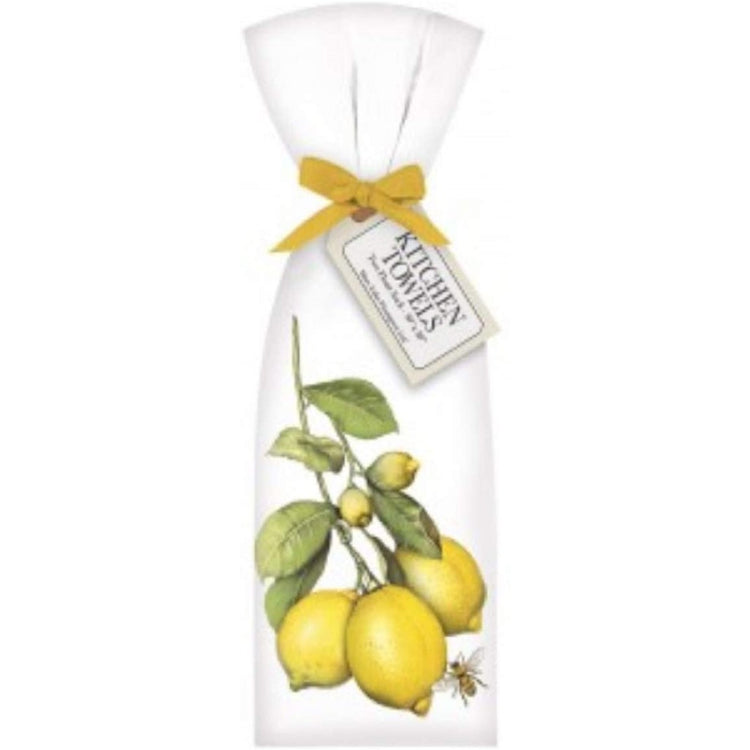 White towel with yellow lemons on a branch.