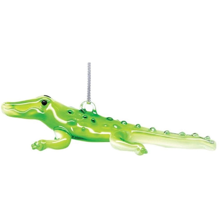 blown glass green alligator ornament on a silver string.