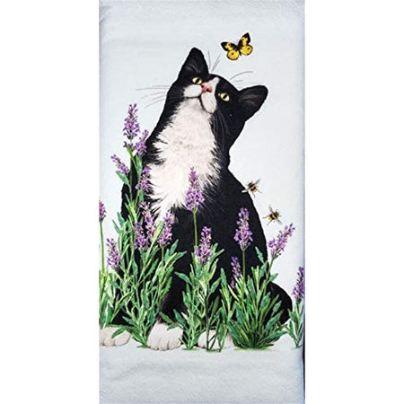 Black & white cat in lavender plants with a butterfly & bees.