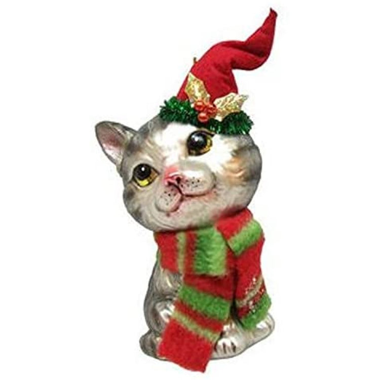Grey tabby with a red & green scarf & stocking hat.