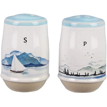 Salt with a boating scene & pepper with a mountain range scene.