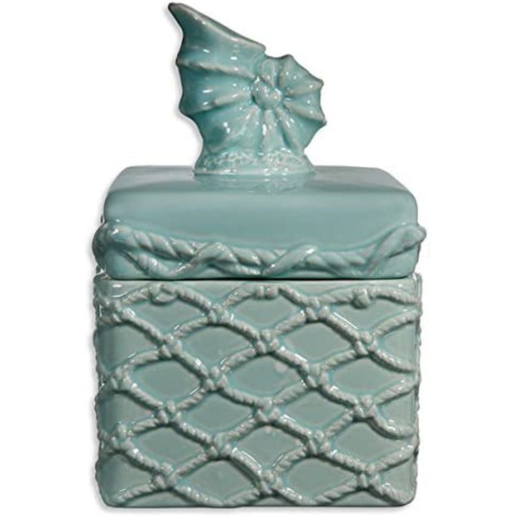 Teal box with a nautilus shell on the lid.