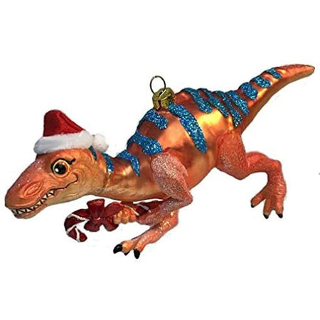 Orange dinosaur with blue stripes, Santa hat, holding a candy cane . Embellished with glitter.