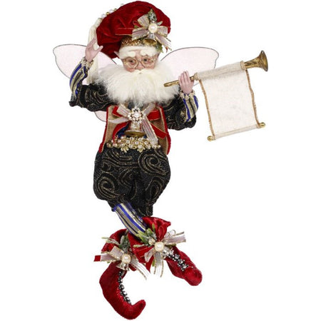 Male fairy figurine dressed in fancy green clothing, red boots, matching puff hat, carrying a horn.