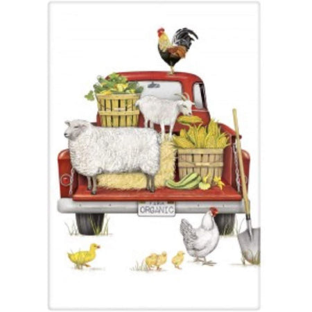 Red truck with farm animals & corn in the bed. 