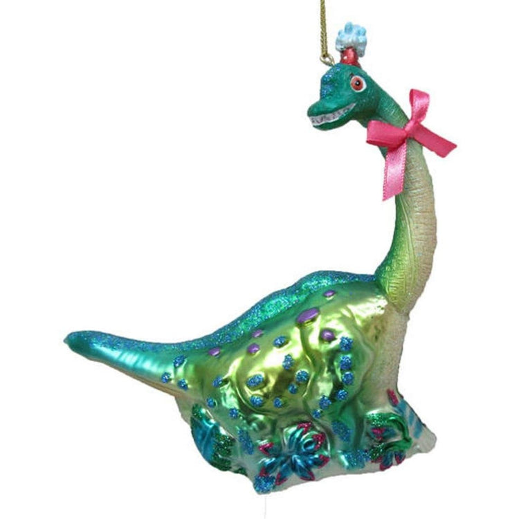 Teal & green long neck dinosaur with blue & purple polka dots and a pink bow on its neck.