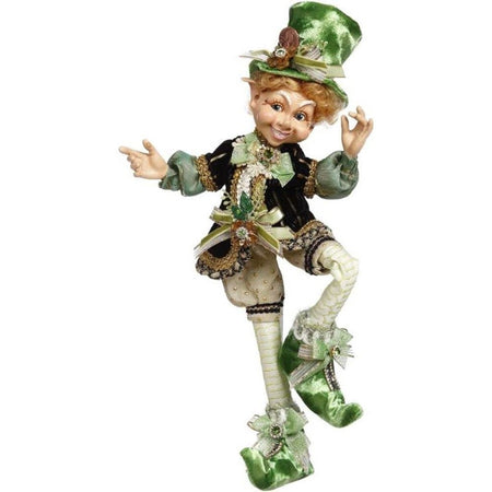 Ginger haired elfin with a leprechaun outfit on.