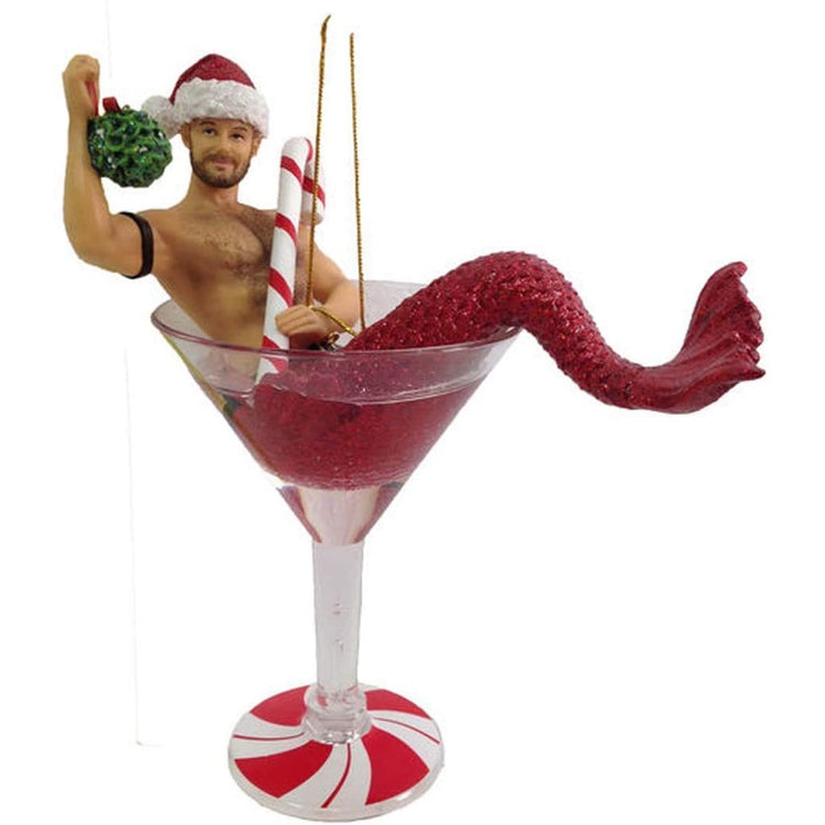 merman with a red tail & santa hat. Holding a candy cane & mistletoe