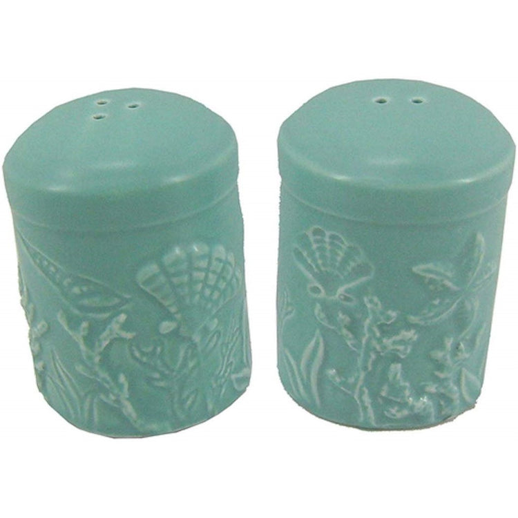 Pair of teal shakers with embossed sealife image in shakers