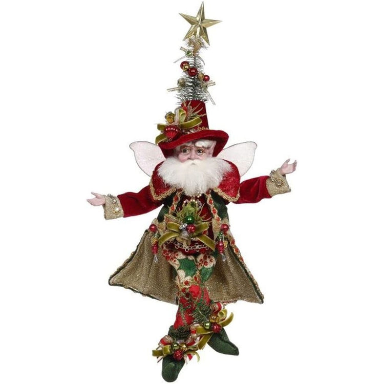 Bearded fairy wearing red coat and top hat with small christmas tree on top.
