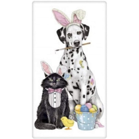 dalmation & a black cat wearing bunny ears & easter eggs in a basket