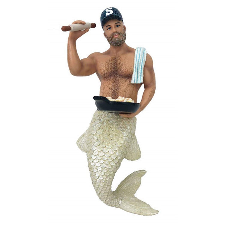 Mermaid figurine ornament.  Dressed as a baker holding a rolling pin and pack of sticky buns.  Hand towel over his shoulder.